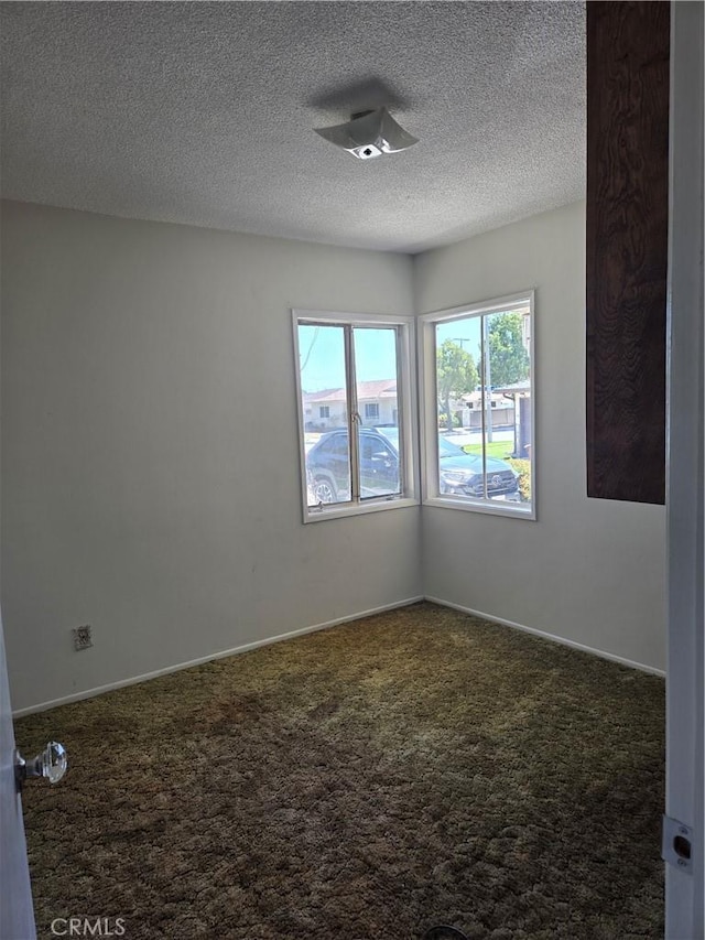 11505 Elmhurst Dr, Norwalk, CA 90650 - carpeted spare room featuring a textured ceiling and baseboards