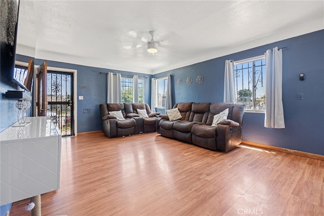 1445 W 155th St, Compton, CA 90220 - living area featuring a ceiling fan and wood finished floors