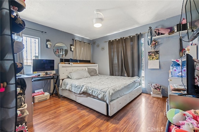 1445 W 155th St, Compton, CA 90220 - bedroom featuring wood finished floors