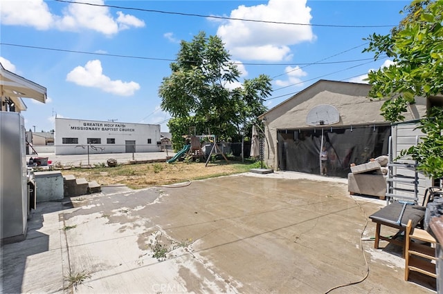 1445 W 155th St, Compton, CA 90220 - view of patio with a playground