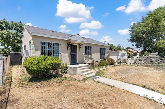 1445 W 155th St, Compton, CA 90220 - bungalow-style house featuring stucco siding
