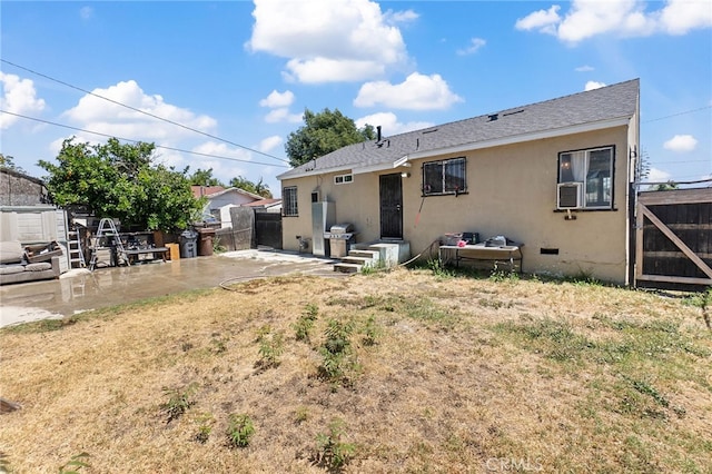 1445 W 155th St, Compton, CA 90220 - back of house featuring stucco siding, a patio, and a shingled roof