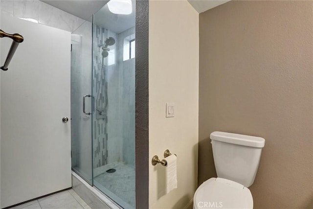 550 Orange Ave Unit 212, Long Beach, CA 90802 - bathroom featuring a shower stall and tile patterned flooring