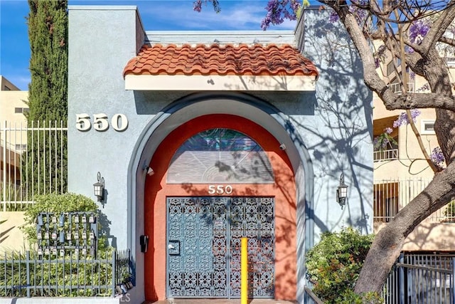 550 Orange Ave Unit 212, Long Beach, CA 90802 - entrance to property with stucco siding and a tile roof