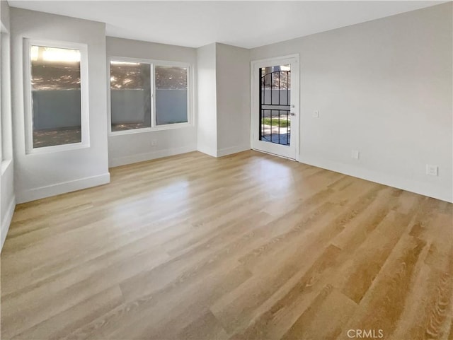 1564 Tanglewood Ln Unit 11, Escondido, CA 92029 - spare room with wood finished floors and baseboards