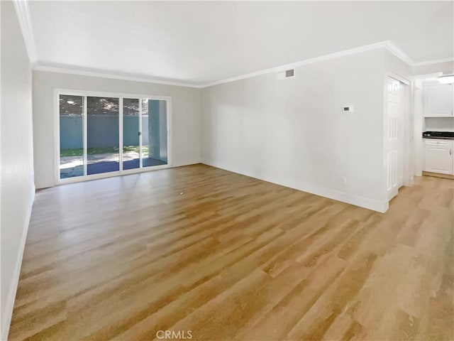 1564 Tanglewood Ln Unit 11, Escondido, CA 92029 - unfurnished room featuring crown molding and light wood finished floors