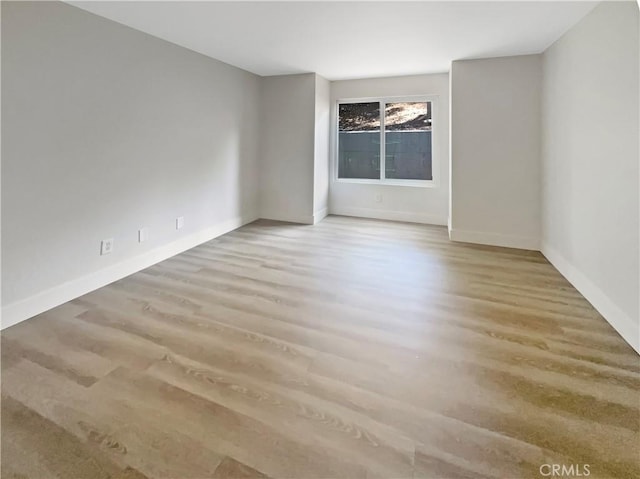 1564 Tanglewood Ln Unit 11, Escondido, CA 92029 - unfurnished room with baseboards and wood finished floors