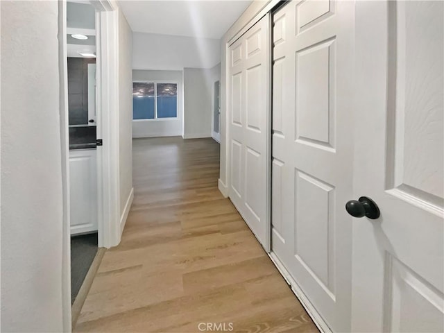 1564 Tanglewood Ln Unit 11, Escondido, CA 92029 - hall with light wood-style floors and baseboards