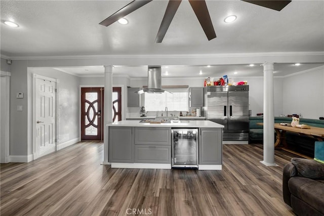 759 S Briargate Ln, Covina, CA 91723 - kitchen with gray cabinets, high quality fridge, beverage cooler, light countertops, and ornamental molding