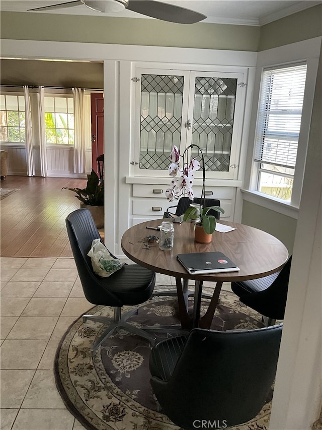 3031 S Denison Ave, San Pedro, CA 90731 - dining area with ornamental molding, light tile patterned floors, and healthy amount of natural light