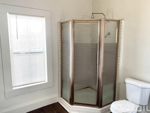 340 E Main St, San Jacinto, CA 92583 - bathroom with a shower stall and wood finished floors