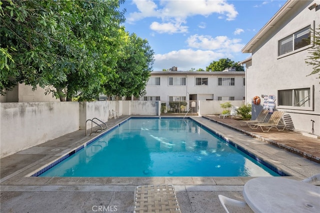 18555 Collins St Unit C30, Tarzana, CA 91356 - community pool featuring a patio