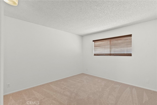 18555 Collins St Unit C30, Tarzana, CA 91356 - unfurnished room with carpet flooring and a textured ceiling