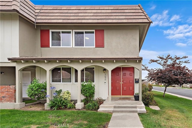 4690 Larwin Ave, Cypress, CA 90630 - view of front of property featuring a front yard and mansard roof