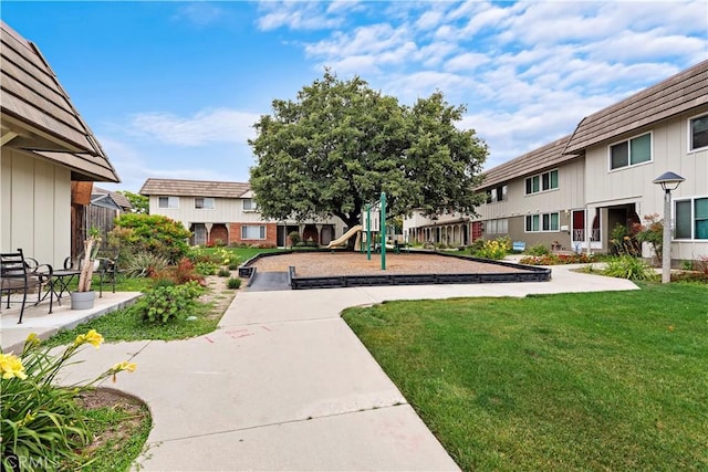 4690 Larwin Ave, Cypress, CA 90630 - view of home's community featuring a lawn and a residential view