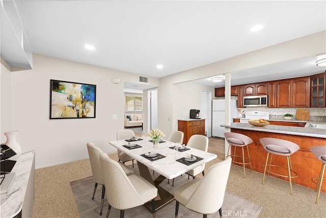 4690 Larwin Ave, Cypress, CA 90630 - dining space featuring light carpet and recessed lighting