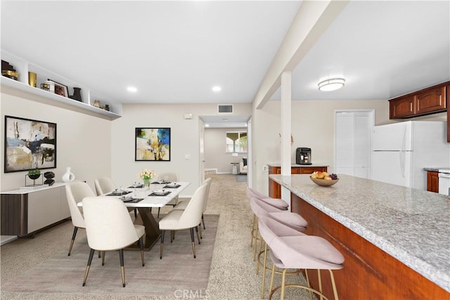 4690 Larwin Ave, Cypress, CA 90630 - dining area with light colored carpet and recessed lighting