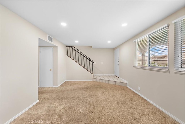 4690 Larwin Ave, Cypress, CA 90630 - unfurnished room with carpet flooring, stairway, and recessed lighting