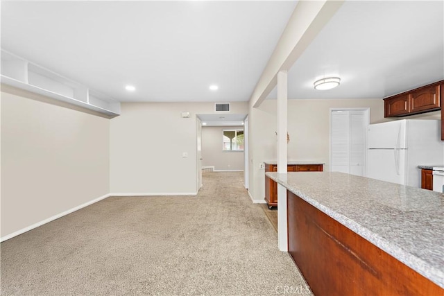 4690 Larwin Ave, Cypress, CA 90630 - kitchen with freestanding refrigerator, light colored carpet, and recessed lighting