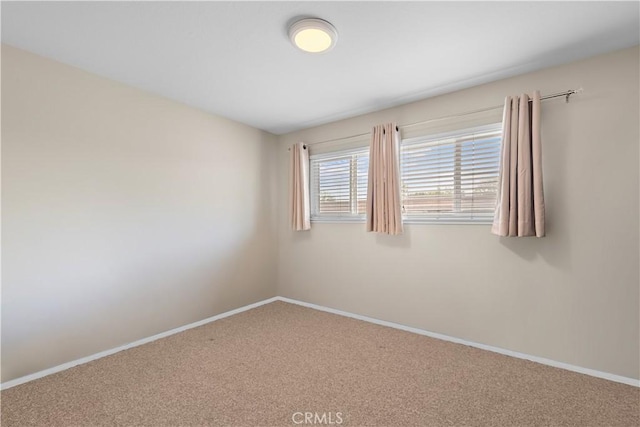 4690 Larwin Ave, Cypress, CA 90630 - empty room with carpet floors and baseboards