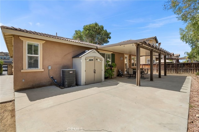 30355 Lamplighter Ln, Menifee, CA 92584 - back of house featuring a storage shed, a patio area, a pergola, and stucco siding