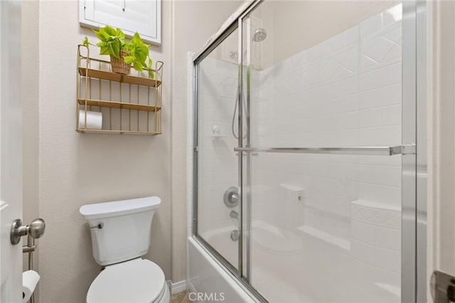 30355 Lamplighter Ln, Menifee, CA 92584 - bathroom featuring shower / bath combination with glass door and toilet
