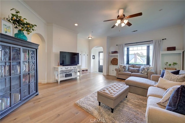 1910 Fixlini St, San Luis Obispo, CA 93401 - living room with arched walkways, a ceiling fan, crown molding, light wood finished floors, and recessed lighting