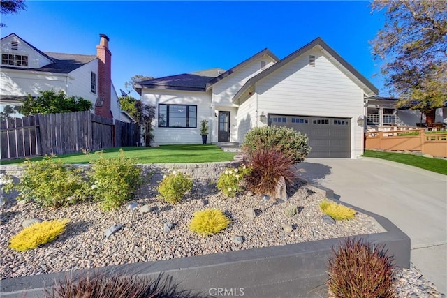 1910 Fixlini St, San Luis Obispo, CA 93401 - view of front facade featuring a garage and driveway