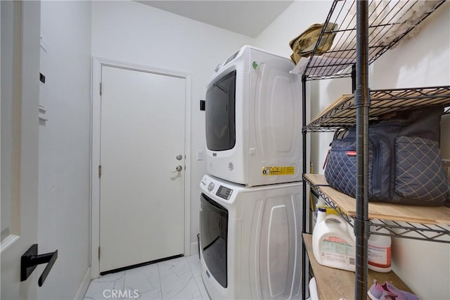 1910 Fixlini St, San Luis Obispo, CA 93401 - laundry area featuring estacked washer and dryer and light marble finish flooring