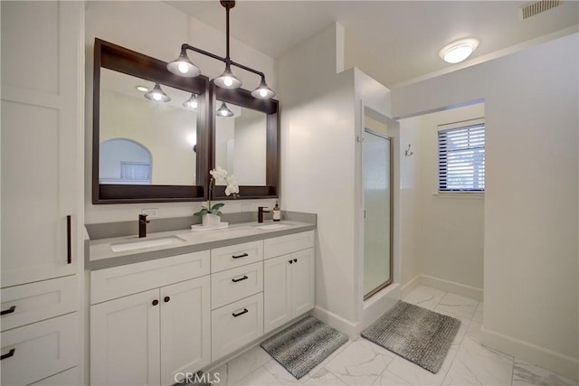 1910 Fixlini St, San Luis Obispo, CA 93401 - bathroom with marble finish flooring, a stall shower, and double vanity