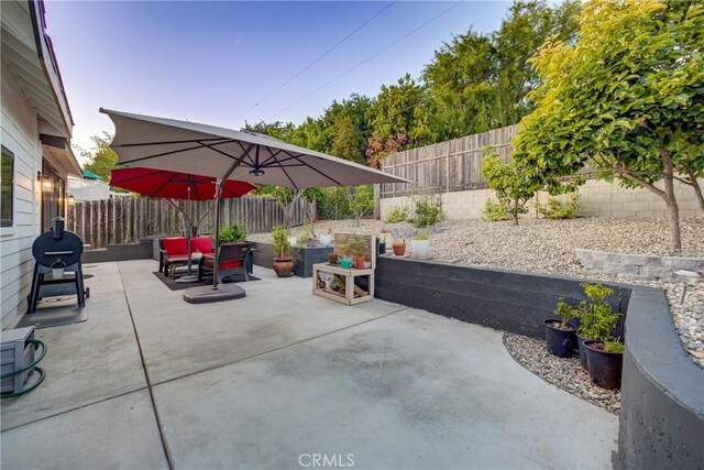 1910 Fixlini St, San Luis Obispo, CA 93401 - fenced backyard with a patio area and a grill
