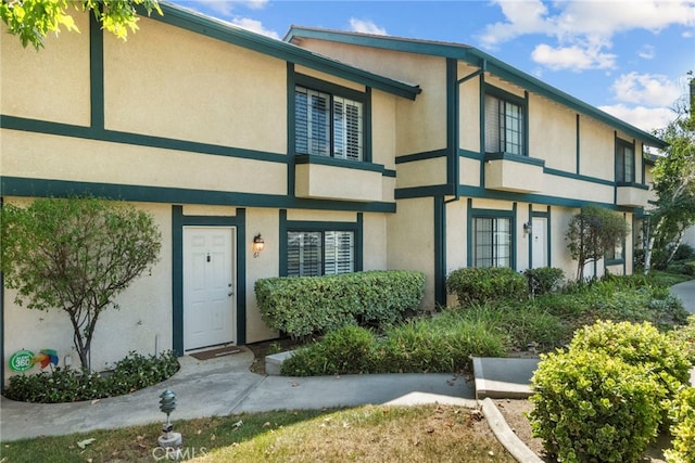 15230 Roxford St Unit 61, Sylmar, CA 91342 - view of front of house with stucco siding