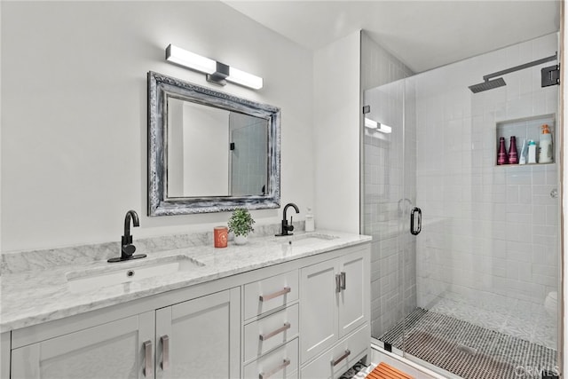15230 Roxford St Unit 61, Sylmar, CA 91342 - full bathroom featuring a shower stall and double vanity