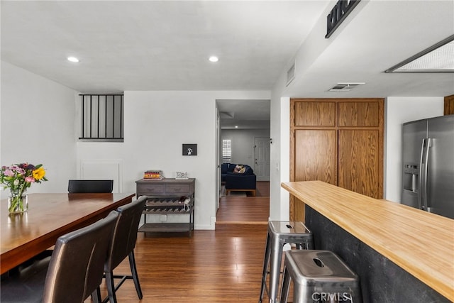 15230 Roxford St Unit 61, Sylmar, CA 91342 - dining space with dark wood-style flooring and recessed lighting