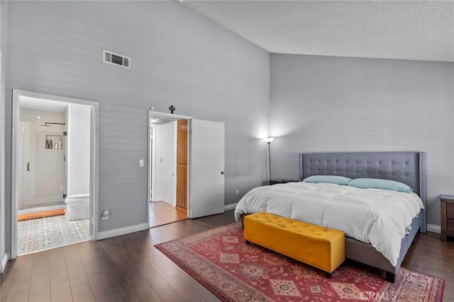 15230 Roxford St Unit 61, Sylmar, CA 91342 - bedroom with high vaulted ceiling, wood finished floors, a textured ceiling, and ensuite bath