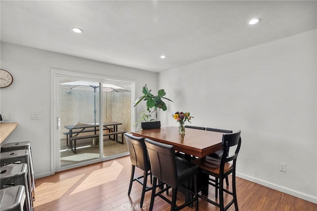 15230 Roxford St Unit 61, Sylmar, CA 91342 - dining area with wood finished floors and recessed lighting