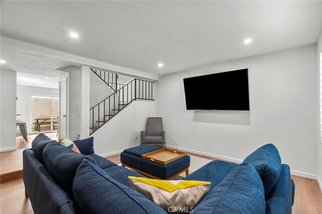 15230 Roxford St Unit 61, Sylmar, CA 91342 - living area with stairs, wood finished floors, and recessed lighting