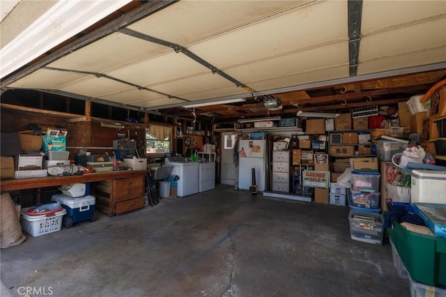 310 E Forhan St, Long Beach, CA 90805 - garage featuring freestanding refrigerator, washing machine and clothes dryer, and a workshop area