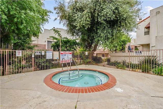 12411 Osborne St Unit 114, Pacoima, CA 91331 - view of swimming pool featuring a community hot tub