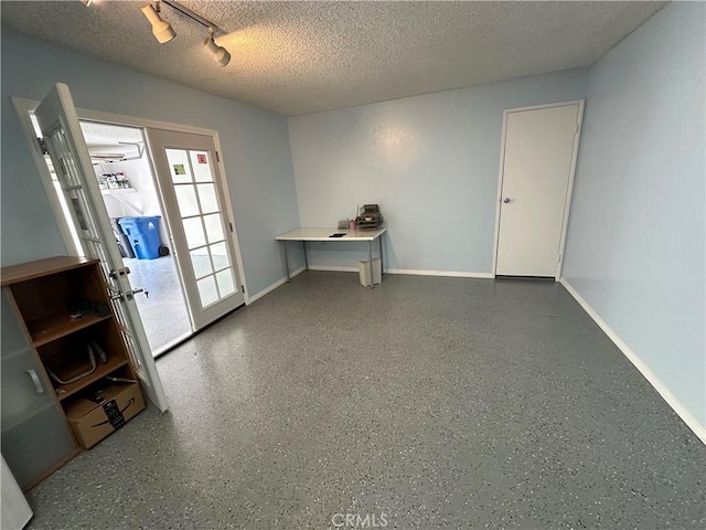 12411 Osborne St Unit 114, Pacoima, CA 91331 - spare room with a textured ceiling and baseboards