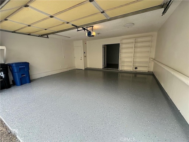12411 Osborne St Unit 114, Pacoima, CA 91331 - garage with a garage door opener