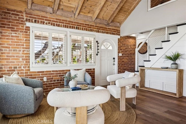 1780 Ocean Blvd, Pismo Beach, CA 93449 - sitting room featuring a wooden ceiling with exposed beams, dark wood-style floors, brick wall, high vaulted ceiling, and stairway