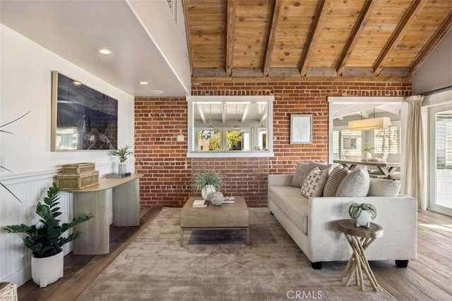 1780 Ocean Blvd, Pismo Beach, CA 93449 - living room with wood ceiling, brick wall, wood finished floors, and plenty of natural light