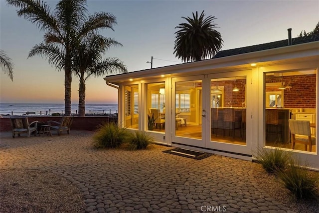 1780 Ocean Blvd, Pismo Beach, CA 93449 - rear view of property with a patio, french doors, and a water view