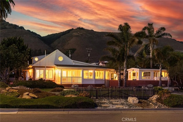 1780 Ocean Blvd, Pismo Beach, CA 93449 - rear view of house with a mountain view and a fenced front yard