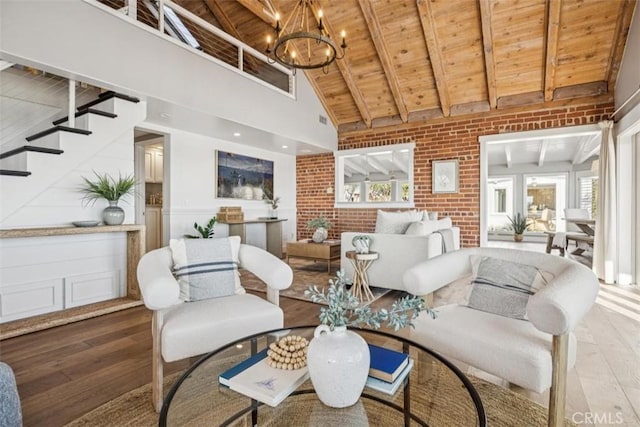 1780 Ocean Blvd, Pismo Beach, CA 93449 - living room with a wooden ceiling with exposed beams, hardwood / wood-style floors, plenty of natural light, a chandelier, and brick wall