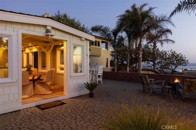 1780 Ocean Blvd, Pismo Beach, CA 93449 - view of patio with an outdoor fire pit and outdoor dining area