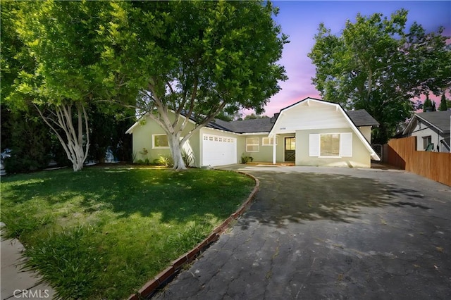 24155 Kittridge St, West Hills, CA 91307 - view of front of home with asphalt driveway and an attached garage