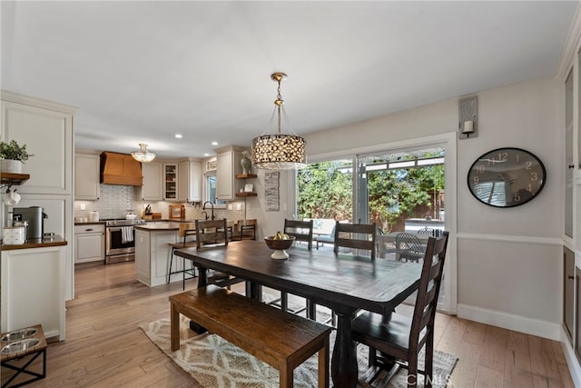 414 Faye Ln, Redondo Beach, CA 90277 - dining room with light wood finished floors, a chandelier, and recessed lighting