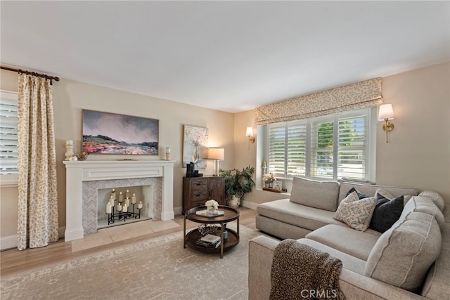 414 Faye Ln, Redondo Beach, CA 90277 - living area featuring a tiled fireplace and wood finished floors